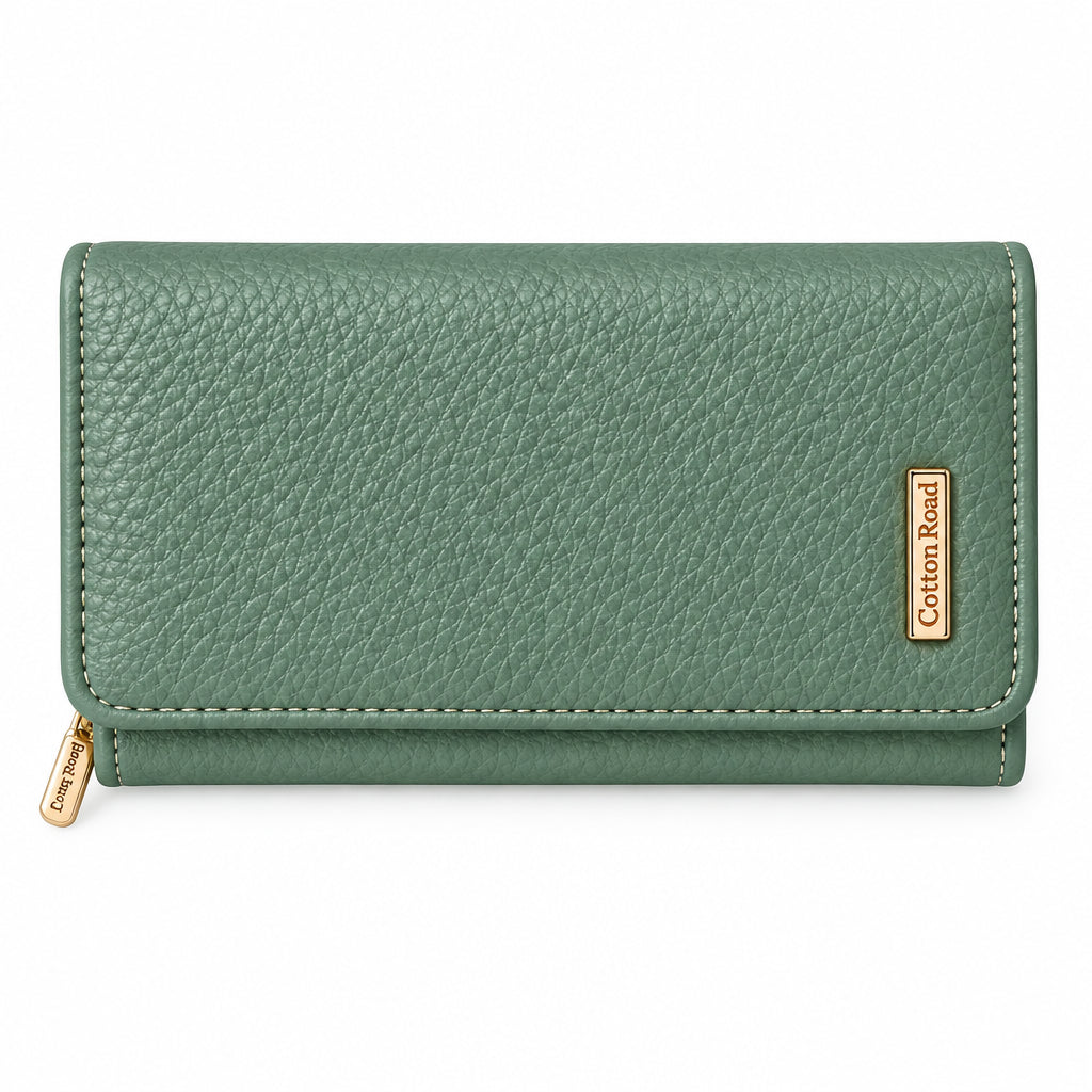 A sage green purse with a pebbled like embossing. Vertical gold-tone 'Cotton Road' brand plaque on the right side, shown against a solid black background.