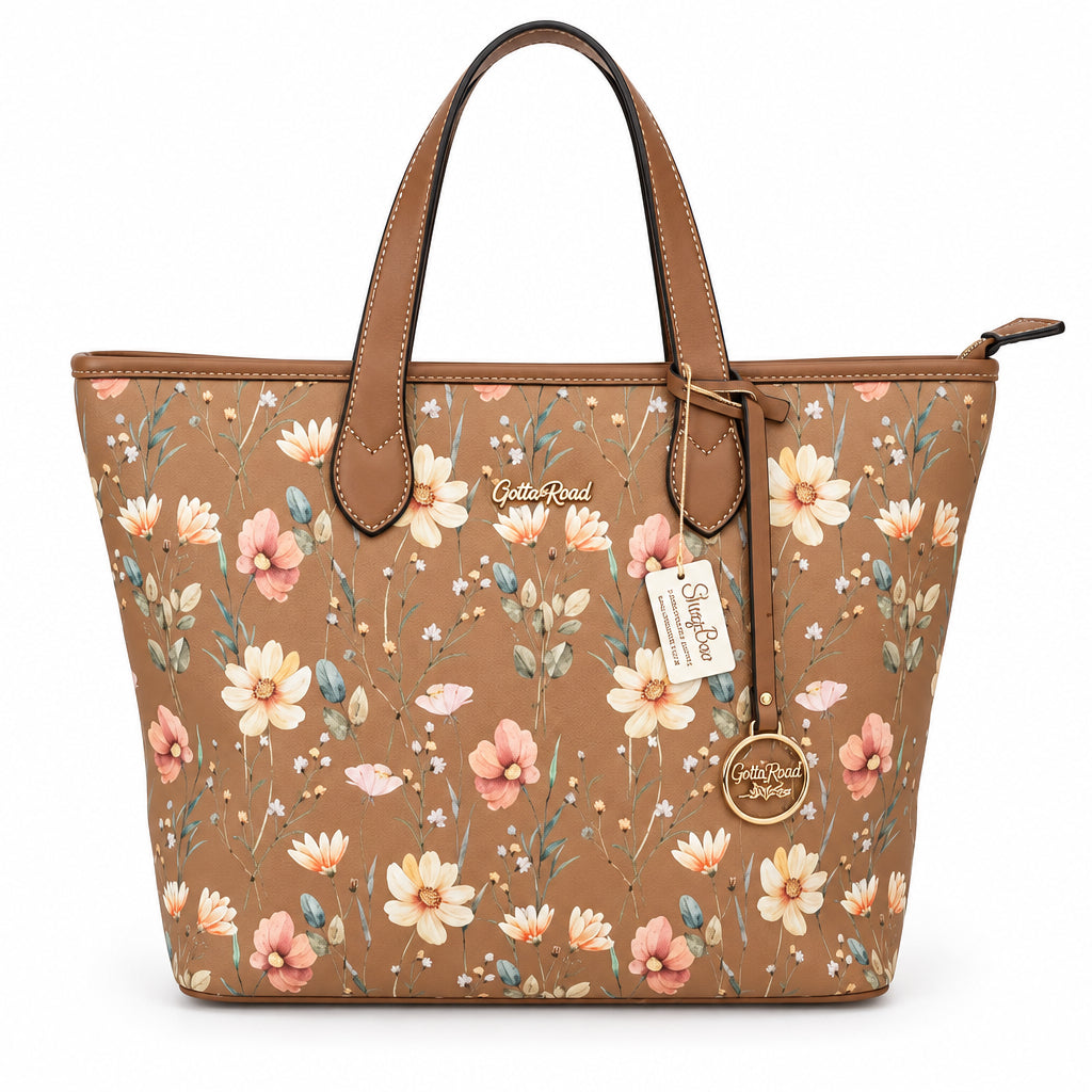 A brown tote bag with a floral print, featuring brown leather handles and a hanging tag, displayed on a white shelf.